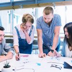 business-discussion-between-young-employees